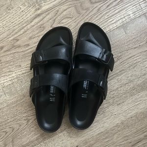 Black plastic Birkenstocks